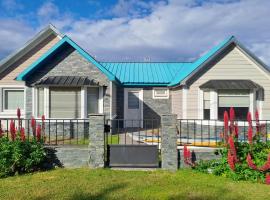 La casa de techo turquesa, casa rústica em Ushuaia