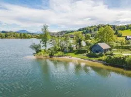 Exklusives Hideaway Auszeit im Seehaus LINDNERS LAKEHOUSE in ruhiger Bestlage mit privaten Sandstrand, eigenes Boot und SUPs
