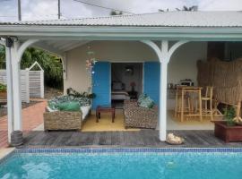 Chambre d'hôte avec vue mer, habitació en una casa particular a Grand-Bourg