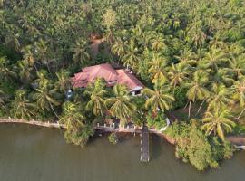 Bellevue Homestay - Ayurvedic Wellness Centre, habitación en casa particular en Kozhikode