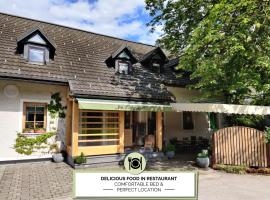 Guesthouse Pri Zalogarju, hotel bajet di Železniki