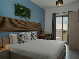 Modern 5-Bedroom Apartment Central Malta, séjour chez l'habitant à Mosta