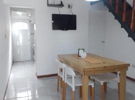 Duplex familiar en San Nicolas, παραθεριστική κατοικία σε San Nicolas de los Arroyos