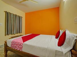 OYO Flagship 81451 Surya Rooms, ξενοδοχείο σε Tumkūr