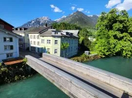Spacious cellar studio surrounded by mountains and lake