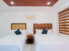 Q Beach Resort, hotell i Cabangan