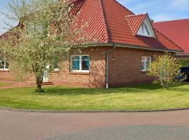 Villa mit Pool und Sauna, hotel with jacuzzis in Norden