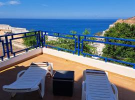 Apartment in Taurito with dream landscape and 30m2 terrace., hotel in Taurito