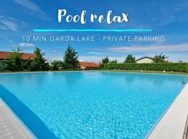 Pool relax - Castelnuovo del garda - Garda Lake - Private Parking, hotel barato en Sandrà