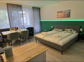 Holiday Suite 304 Residenza Lago di Lugano, alojamento na praia em Bissone