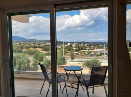 AIR-IN Rooms with magnificent views- Airport shuttle, serviced apartment in Artemida