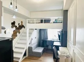 "Stylish Loft Condo with High-Speed WiFi at Avida Towers"