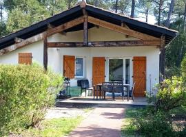 chalet T4 ondres piscine et tennis, hotel in Ondres