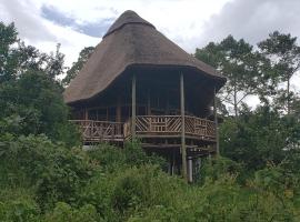 Kibale Tourist Safari Lodge, brunarica v mestu Nkingo