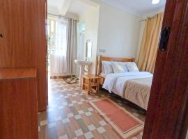 Mayas Suites โรงแรมในเนย์รี