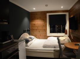 Fossheim Lodge - arealeffektiv minileilighet, hôtel à Torset