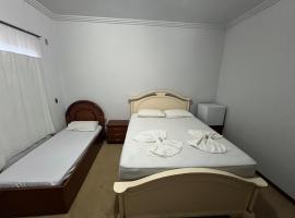 Suíte no centro com 2 camas e hidromassagem, habitación en casa particular en Sinope