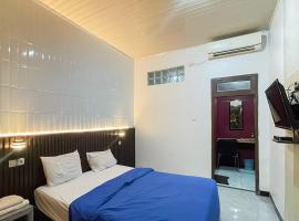 Urbanview Hotel Delima 101 Syariah, жилье для отдыха в городе Серанг