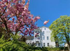 Ferienwohnung mit Meerblick und Sauna, sted med privat overnatting i Göhren