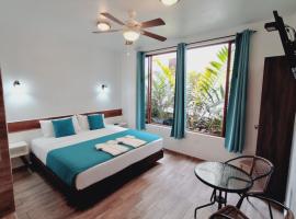Toucan Platinum Suites Aparthotel, παραθεριστική κατοικία σε Mindo