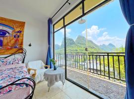 Yangshuo Mountaintop Resort 阳朔半山居民宿-Yogis House, ξενοδοχείο σε Yangshuo