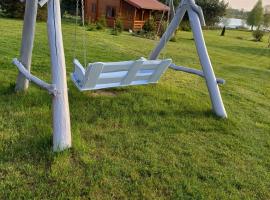 Domki na mazurach nad jeziorem Ublik Wielki、ミウキのホテル