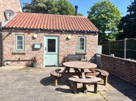 Cosy Village location - One Bedroom Barn, hotel with parking in Barmston