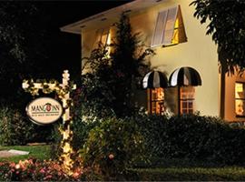 Mango Inn Bed and Breakfast: Lake Worth şehrinde bir otel