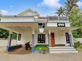 OYO Flagship SIVANANDA HOMESTAY: Varkala şehrinde bir otel