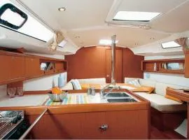 Bed on Boat 37, by Sunset