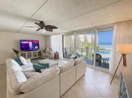 Coastal condo with beachfront views and pool access!