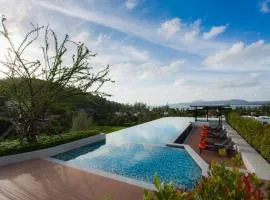 Comfy 1 Bedroom Condo in Surin (Seaview Rooftop Pool & Gym)