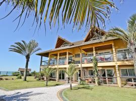 Praia do Estaleiro Guest House, готель у місті Балнеаріу-Камборіу