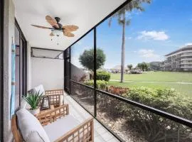 Walkout condo with beach access, pool and pickleball