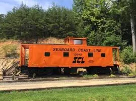 Seaboard Coast Line 0843 sleep in a caboose on a bison ranch