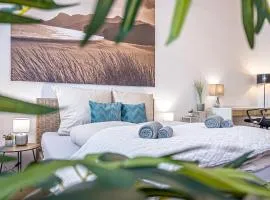 Gemütliche Ferienwohnung mit 2 Schlafzimmern, kostenfreiem Parkplatz, modernem Bad, Küche, Waschmaschine & Trockner