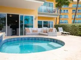 Beachfront - Garden Delight 2BR condo - E125-2