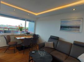 FeWo Terrassenhaus Duhnen mit Meerblick - 6. Etage, ξενοδοχείο στο Κουξχάφεν