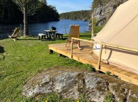 Hommen Gård Glamping, недорогой отель в городе Рисёр