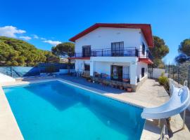 Casa con piscina privada en Sant Pol de Mar, cabaña o casa de campo en Sant Pol de Mar