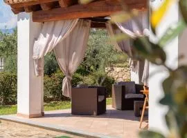 Villetta con Patio, Giardino Recintato, Doccia Idromassaggio Tanaunella - Budoni