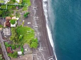 The Hidden Escapes Amed- 2BR Beachfront Villa with Direct Beach Access