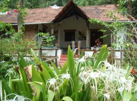 Rainforest Retreat at Mojo Plantation, hotel in Madikeri