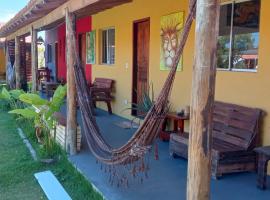 Villa do ET Caraíva - Suíte com piscina e ar condicionado a 100mts da praia، كوخ في كرايفا