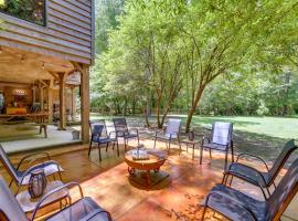 Idyllic Riverfront Cabin with Outdoor Oasis!, hotel with parking in Collins