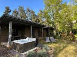 Lodge familial avec jacuzzi privatif, accès piscine et nombreuses activités au bord du golf - FR-1-582-367