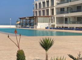 Appartement pied dans l’eau à 10 min d’Agadir, hótel í Aourir