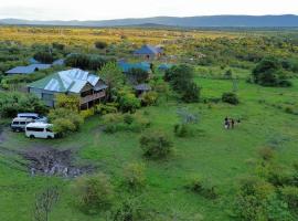 Eco mara forest camp, luxe tent in Ololaimutiek