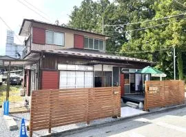 In front of Nikko Station 3BR Big Yard House