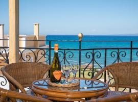 Casa di Cuore - Beachfront, Ferienhaus in Argassi